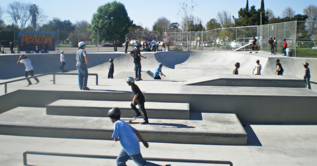 People skateboarding at Pedlow skatepark.