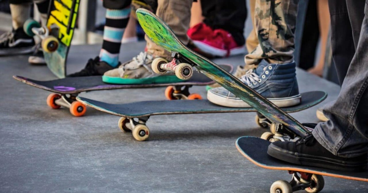 Skateboarders standing in a line