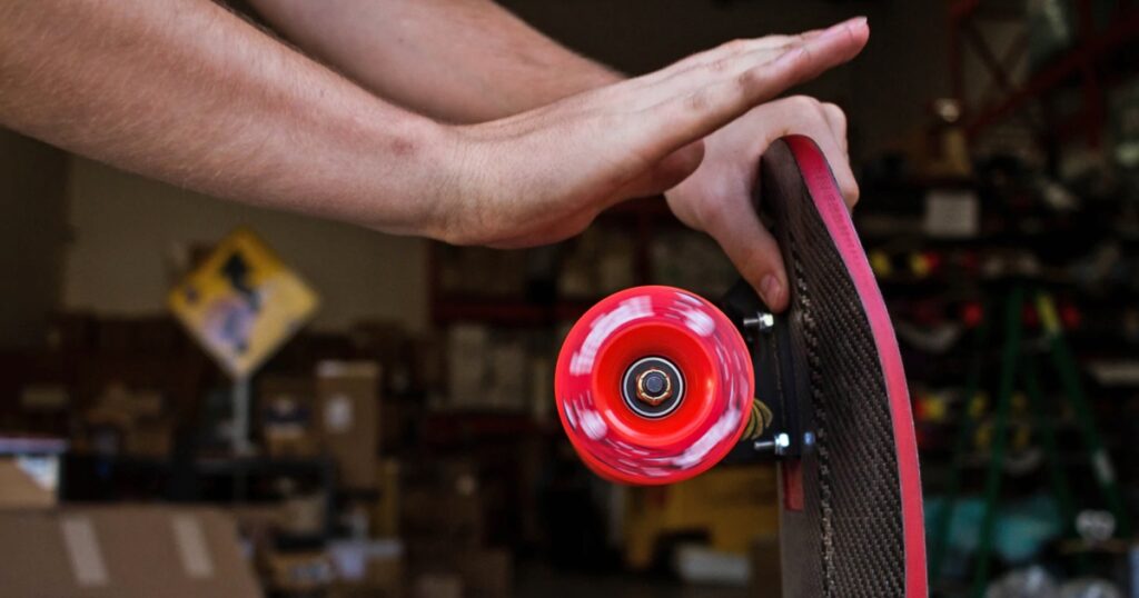 spinning a skateboard wheel by hand